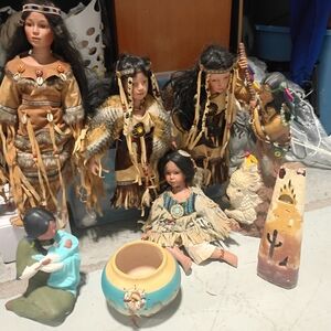 Cultural Heritage Doll Collection with Brown and Tan Attire